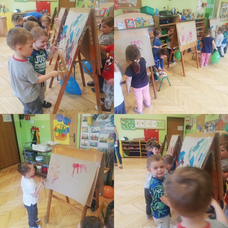 Dzieci malują farbami na sztalugach