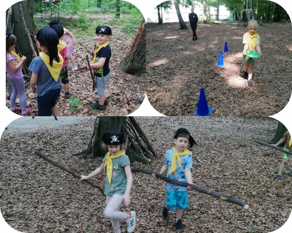 Dzieci  budują szałas w lesie